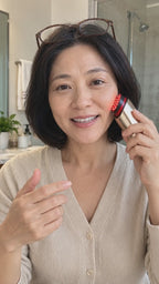 RejuvaRay Face Glow Massager in use